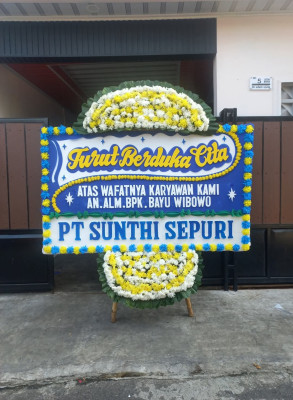 Papan Bunga Duka di Natal