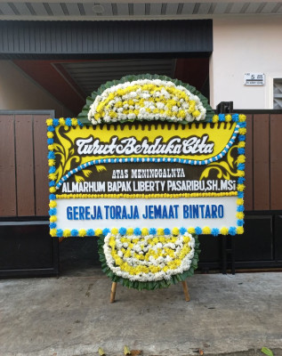 Papan Bunga Duka di Natal