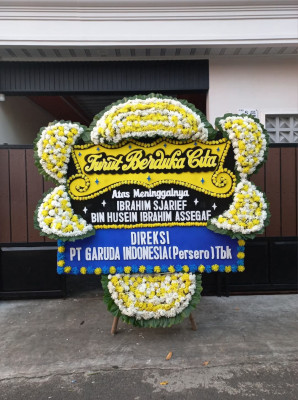 Papan Bunga Duka di Natal
