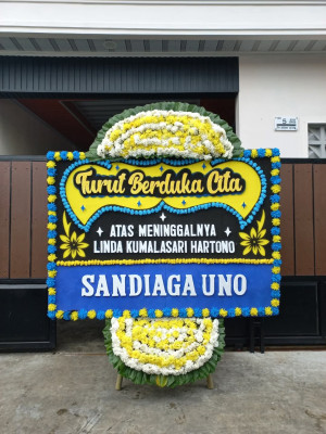 Papan Bunga Duka di Natal